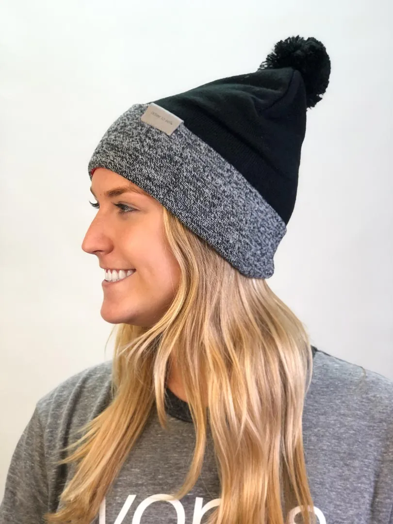 knit beanie with I am strong™ on inside cuff