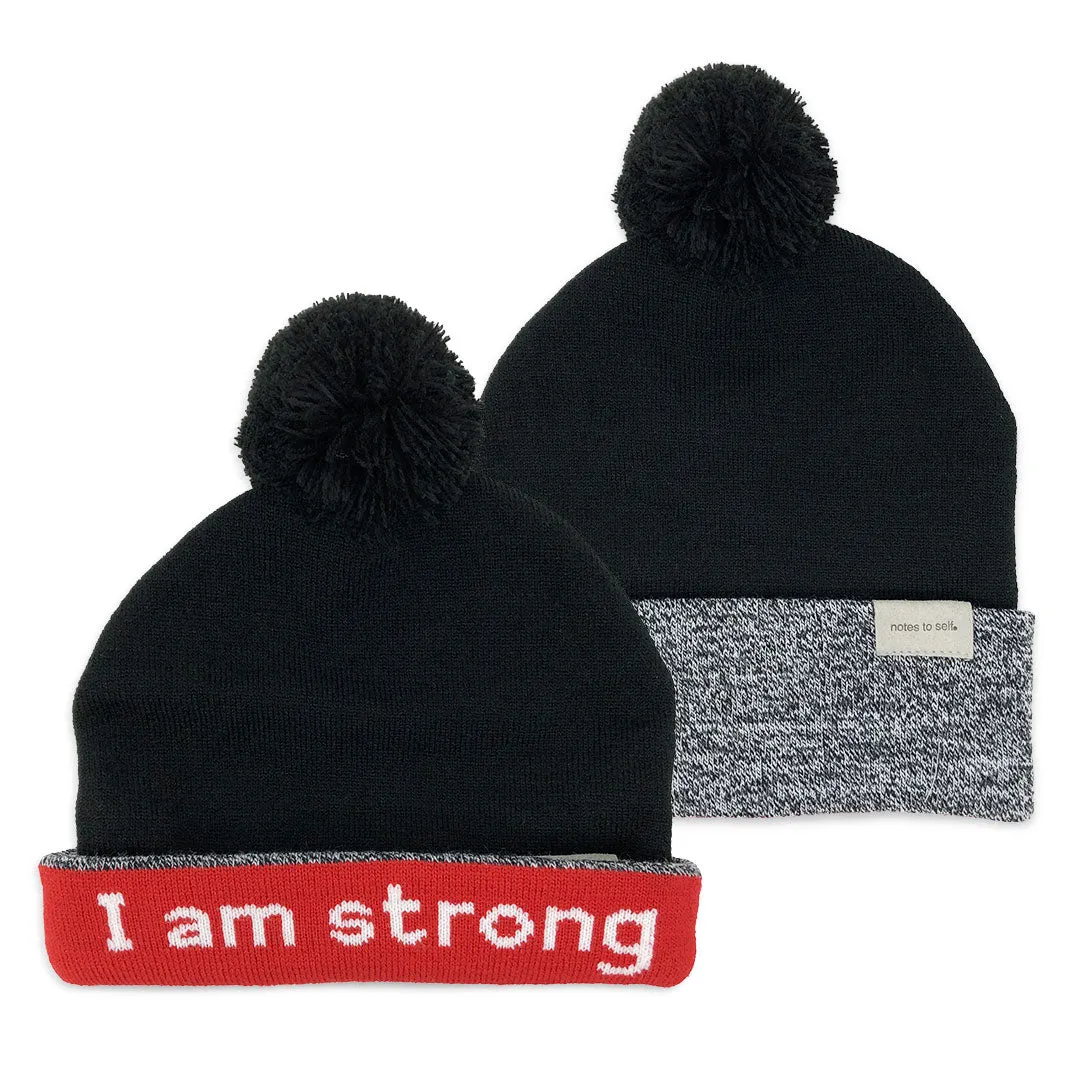 knit beanie with I am strong™ on inside cuff