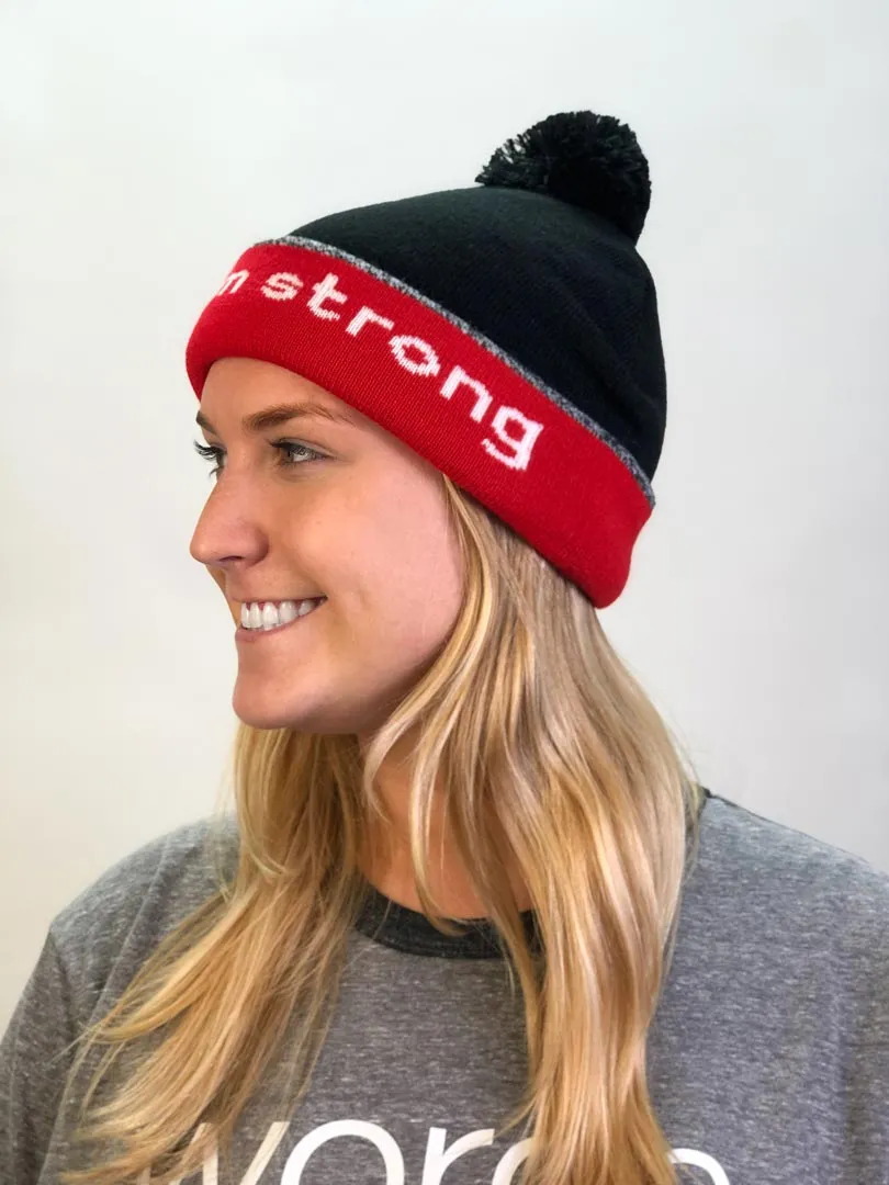 knit beanie with I am strong™ on inside cuff